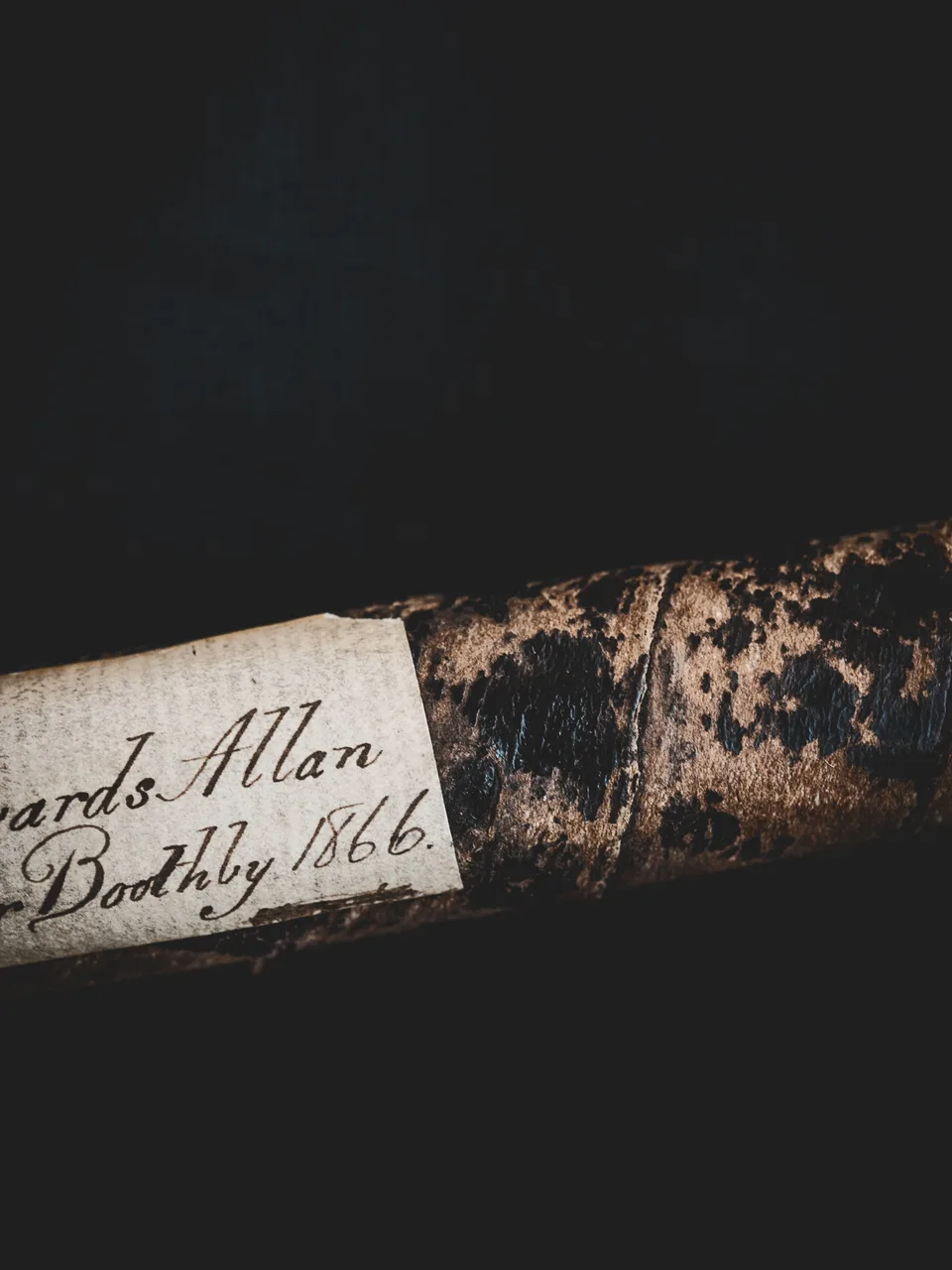 An old club bearing a handwritten paper label dated 1866