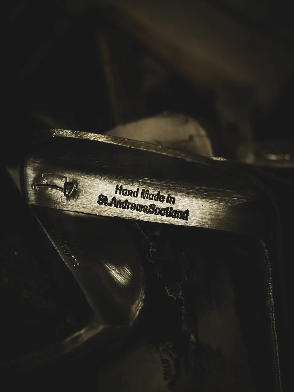 A club head stamped Hand Made in St Andrews Scotland
